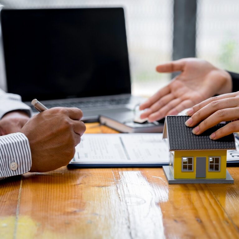 Insurance agent broker man holding document and present pointing showing an insurance policy contrac